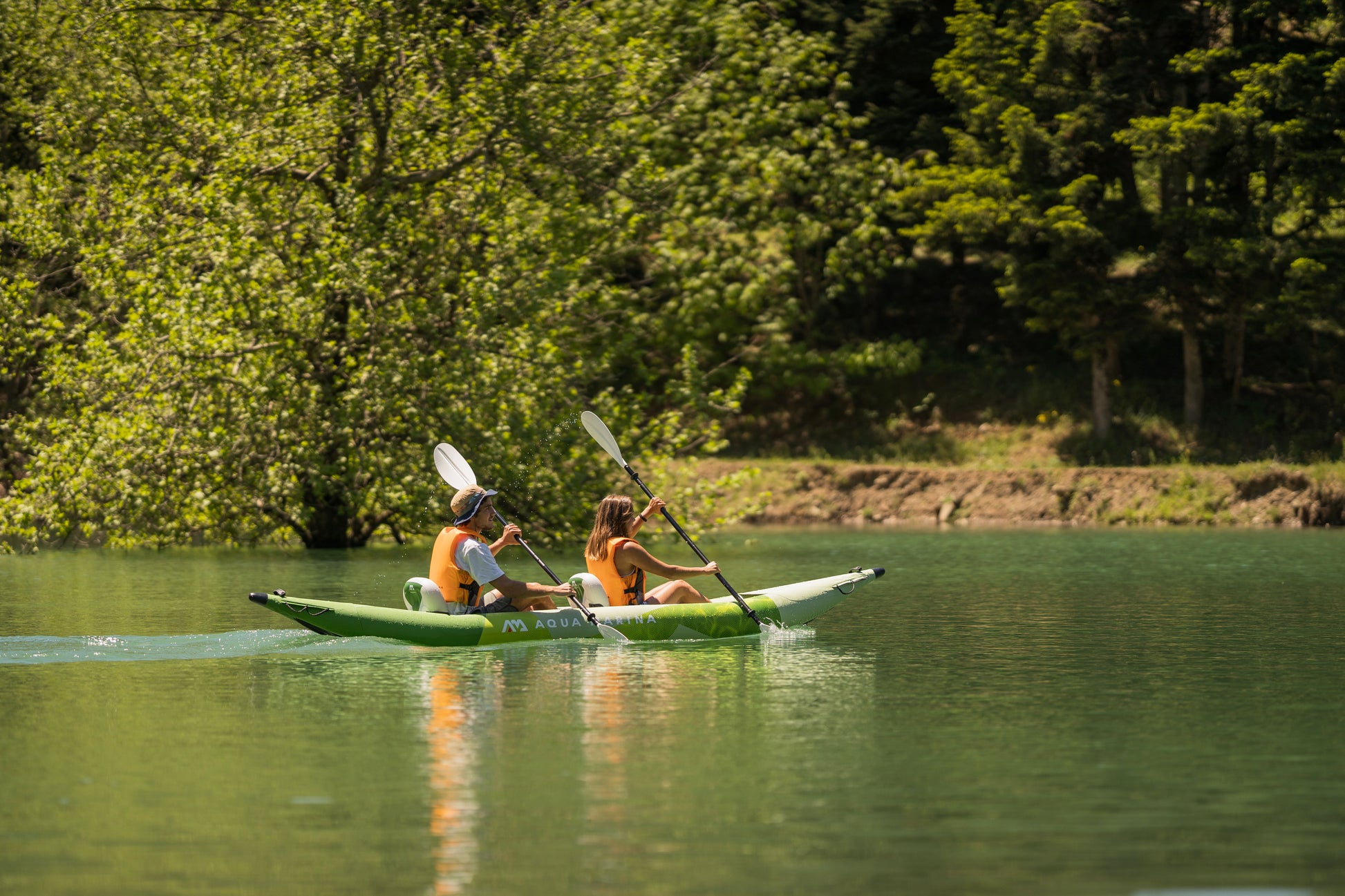 Two kayakers in lessons at MontanaBoardingSchool.com private kayak sessions. Rent from MTBoarders or buy from eboarders.