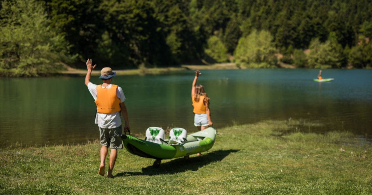 Two kayakers ready for lessons at MontanaBoardingSchool.com private kayak sessions. Rent from MTBoarders or buy from eboarders.