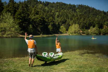 Two kayakers ready for lessons at MontanaBoardingSchool.com private kayak sessions. Rent from MTBoarders or buy from eboarders.